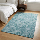 3' X 5' Turquoise And Ivory Paisley Washable Area Rug With UV Protection