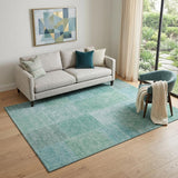 5' X 8' Teal And Ivory Patchwork Washable Area Rug With UV Protection