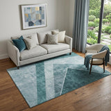 5' X 8' Teal And Ivory Geometric Washable Area Rug With UV Protection