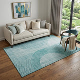 5' X 8' Teal And Ivory Geometric Washable Area Rug With UV Protection