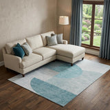 8' X 10' Teal And Ivory Geometric Washable Area Rug With UV Protection