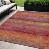 5' X 8' Pink Orange And Gold Abstract Washable Indoor Outdoor Area Rug