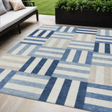 5' X 8' Navy Blue Ivory And Khaki Geometric Washable Indoor Outdoor Area Rug
