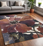 5' X 8' Pink Green And Beige Botanical Leaves Area Rug