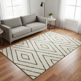 5' X 8' Cream And Green Geometric Area Rug