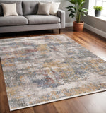 5' X 8' Cream Blue And Yellow Abstract Area Rug