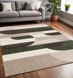5' X 8' Cream Green And Brown Geometric Area Rug