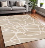5' X 8' Cream And Tan Abstract Area Rug