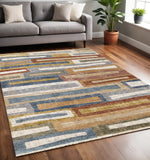 5' X 8' Orange Blue And Beige Geometric Area Rug