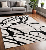 5' X 8' Black And Gray Abstract Area Rug