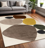 5' X 8' Cream And Brown Geometric Area Rug