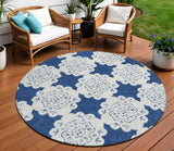 8' Navy Blue And Ivory Round Quatrefoil Washable Indoor Outdoor Area Rug
