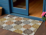 3' X 5' Taupe Orange And Ivory Quatrefoil Washable Indoor Outdoor Area Rug