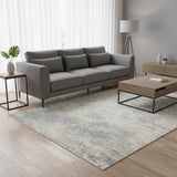 5' X 8' Cream And Blue Abstract Area Rug