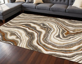 7' X 10' Cream And Beige Abstract Area Rug