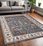5' X 8' Blue Cream And Yellow Medallion Area Rug
