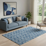 5' X 8' Blue And Ivory Polka Dot Washable Area Rug With UV Protection