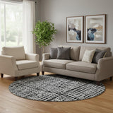 8' Black And Ivory Striped Washable Round Rug With UV Protection
