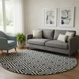 8' Black And Ivory Geometric Washable Round Rug With UV Protection