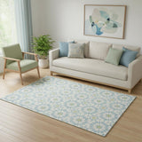 5' X 8' Sky Blue Ivory And Green Geometric Washable Area Rug With UV Protection