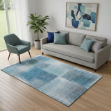5' X 8' Denim Blue And Ivory Abstract Washable Area Rug With UV Protection