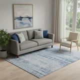 5' X 8' Sky Blue And Gray Abstract Washable Area Rug With UV Protection