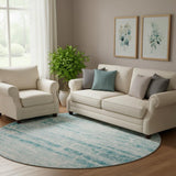 8' Teal And Ivory Abstract Washable Round Rug With UV Protection
