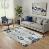 5' X 8' Navy Blue Gold And Ivory Ikat Washable Area Rug With UV Protection