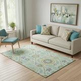 5' X 8' Mint Green Blue And Beige Floral Washable Area Rug With UV Protection