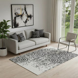 5' X 8' Black And Ivory Medallion Washable Area Rug With UV Protection