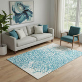 5' X 8' Teal And Ivory Medallion Washable Area Rug With UV Protection