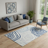 5' X 8' Blue And Ivory Abstract Washable Area Rug With UV Protection
