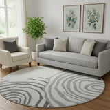8' Gray Silver And Beige Abstract Washable Round Rug With UV Protection