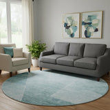 8' Teal And Ivory Geometric Washable Round Rug With UV Protection