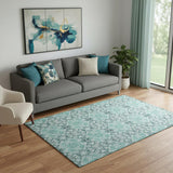 5' X 8' Teal And Ivory Medallion Washable Area Rug With UV Protection