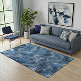 5' X 8' Blue Ivory And Charcoal Abstract Washable Area Rug With UV Protection