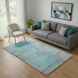 5' X 8' Teal And Gray Abstract Washable Area Rug With UV Protection
