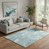 5' X 8' Teal And Ivory Abstract Washable Area Rug With UV Protection