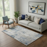 5' X 8' Blue Taupe And Ivory Abstract Washable Area Rug With UV Protection