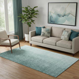 5' X 8' Teal And Ivory Ombre Washable Area Rug With UV Protection