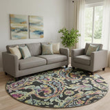 8' Black Blue And Pink Paisley Washable Round Rug With UV Protection