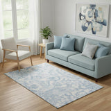 5' X 8' Sky Blue And Ivory Paisley Washable Area Rug With UV Protection