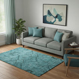 5' X 8' Teal And Gray Floral Washable Area Rug With UV Protection