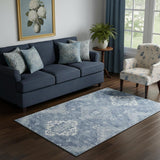 5' X 8' Blue And Ivory Medallion Washable Area Rug With UV Protection