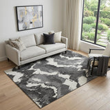 5' X 8' Black And Ivory Abstract Washable Area Rug With UV Protection