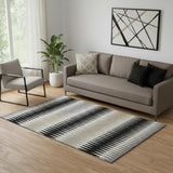 5' X 8' Black Gray And Ivory Striped Washable Area Rug With UV Protection