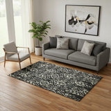 5' X 8' Black Gray And Beige Floral Washable Area Rug With UV Protection