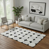 5' X 8' Black And Ivory Abstract Geometric Washable Area Rug With UV Protection