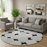 8' Black And Ivory Abstract Geometric Washable Round Rug With UV Protection