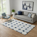 5' X 8' Navy Blue And Ivory Abstract Geometric Washable Area Rug With UV Protection